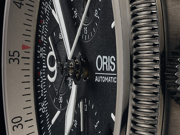 Montre Oris Big Crown X1 Calculator, détails du cadran et de la lunette tournante avec règle à calcul circulaire.